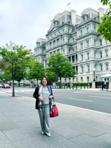 Founder by the federal buildings after a meeting with SEC's Office of Diverse Minority Development Director in Washington DC